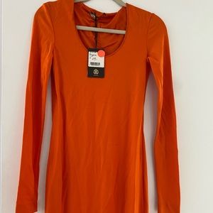 New with tags sexy and sleek orange Cavalli long dress.